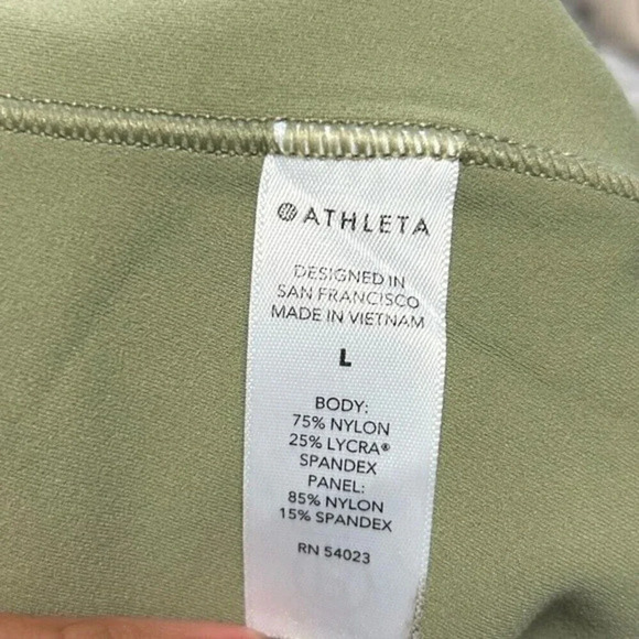 Athleta Green Salutation Stash Pocket II Cutout 7/8 Leggings Size L Women gym - Picture 14 of 15